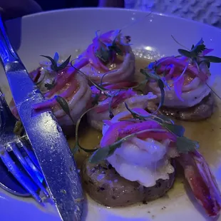 GARLIC SHRIMP delicious perfectly cooked shrimp the butter sauce is light and bold. The potatoes were good as well.