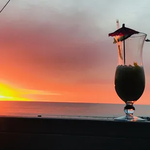 Sip away &amp; soaking in the stunning sunset!