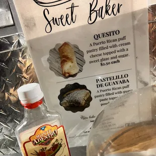 a menu and a bottle of sweet baker