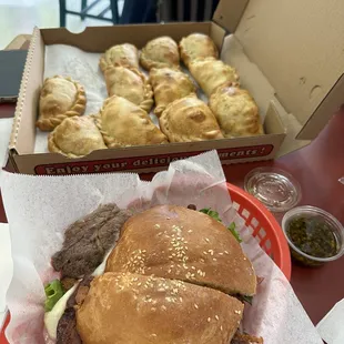 Dozen empanadas and chivito sandwich
