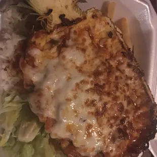 Pina Carnaval is half grilled pineapple stuffed with seafood