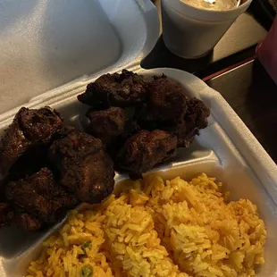 Chicharrones, yellow rice and red beans