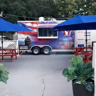 a food truck parked in a parking lot