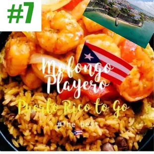 a plate of rice with shrimp and an american flag