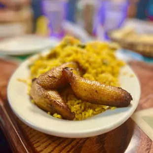 Chicken with yellow rice and maduros