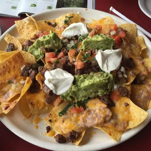 Steak nachos for two under 8$. Doesn&apos;t get any better.