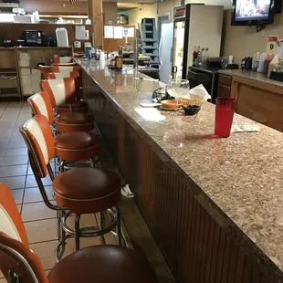 Cool bar area with retro bar stools!