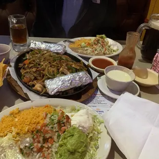 a table full of mexican food