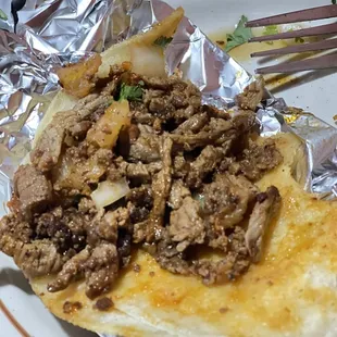 Look at al pastor,, never had alpastor that was grounded and meat look like grounded beef and dry steak,