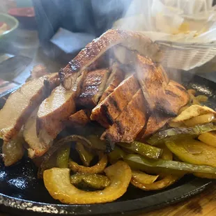 Literally sizzling pollo asado fajitas