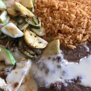 Zucchini chicken with beans and rice