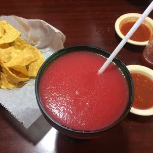 Strawberry margaritas the color of fake watermelon.