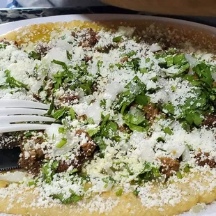 a plate of food with a fork and knife