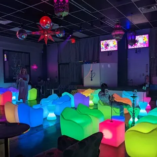 a room full of colorful chairs