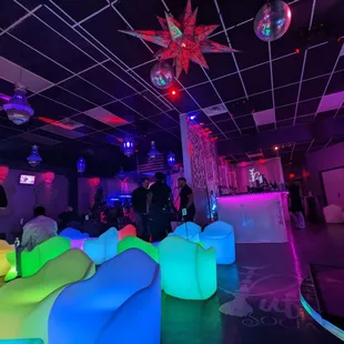 people sitting on bean bags