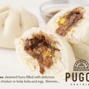 a close up of a bun with a bite taken out of it