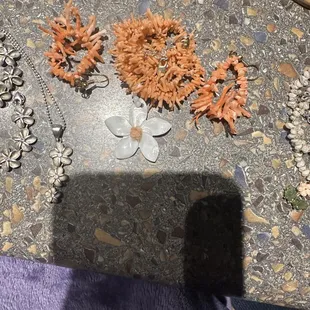 Close up of the gorgeous coral and sea shell necklace and earrings we bought in 2021