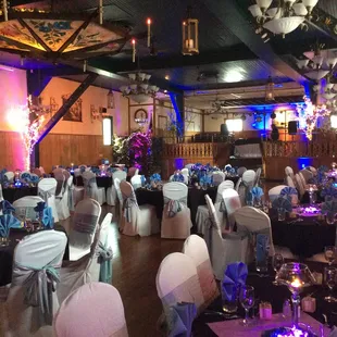 Alpine room with chair covers and uplighting