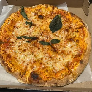 Regular Margherita pizza, ask for the traditional Neapolitan Margherita!