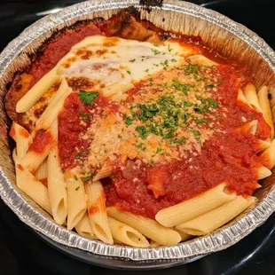 Eggplant Parmigiana. Eggplant lightly breaded, fried &amp; baked in tomato sauce w/ mozzarella. Penne w/ tomato sauce, salad &amp; bread. $12.99.