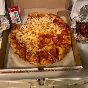 Half and half pizza with bbq and honey hot wings! Yum.