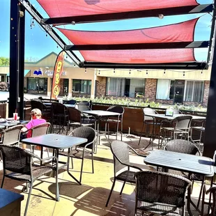 a little girl sitting at a table