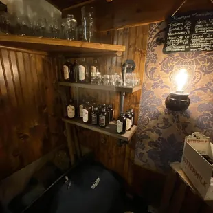 shelves with bottles and glasses
