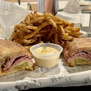 Cubano sandwich with a side of Pullman Spice fries and garlic aioli