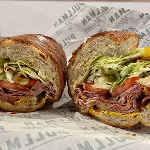 La Italiana: house-cured salami, coppa, &amp; prosciutto cotto, spicy mustard, lettuce, tomato, onions, oil, vinegar, &amp; herbs on a hoagie