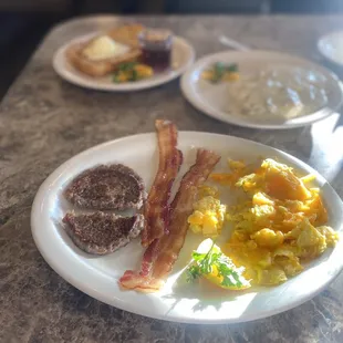 French Toast, Biscuits and Gravy, and two eggs, bacon, and sausage