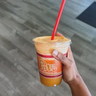 my personalized fresh juice . Apple base, with Carrots, kale, and ginger added.