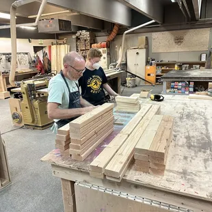 Preparing boards for the bed construction.