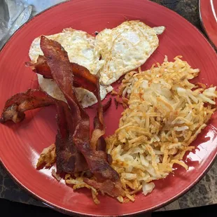 The Grinder Platter with bacon &amp; eggs over medium (pancakes not pictured but they are AMAZING!)
