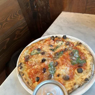 supposed to be a margarita with black olives, very badly on the bottom burnt