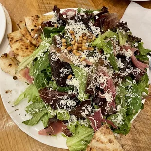 Punch Salad: lettuce, prosciutto, pine nuts and Parmesan with rosemary bread.