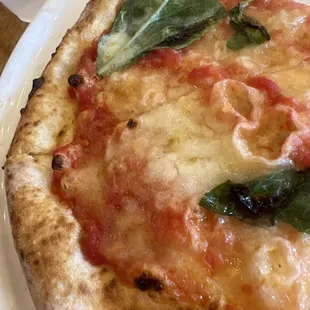 Margarita Pizza with light cheese as requested.