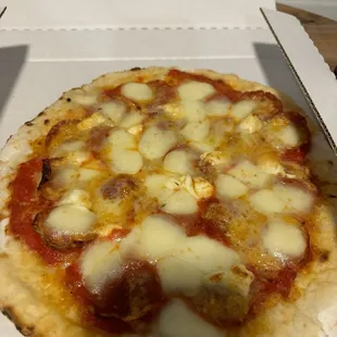 Four cheese one with pepperoni added