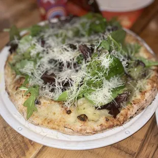 Dino Z - 7/10 it has good flavor, but felt like the balsamic vinegar gets the pizza dough too wet so it doesnt hold up any of the toppings.