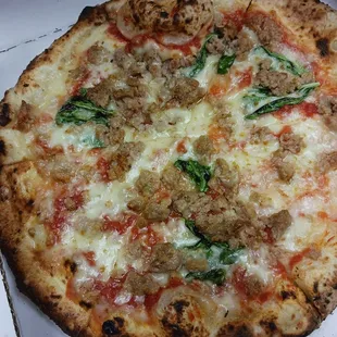 Margarita pizza with sausage added