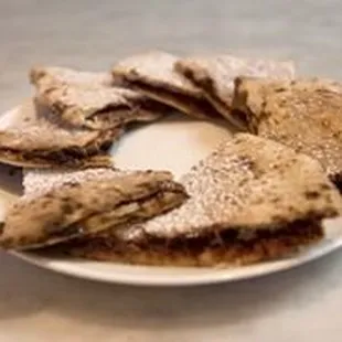 Chocolate Hazelnut Panini: Oven split focaccia filled with organic chocolate hazelnut spread, served hot