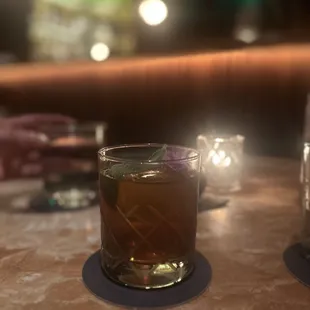 a shot of a drink in a glass