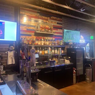 a bar with a large screen