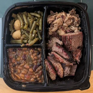 This is the Pulled Pork and Sliced Brisket Combo Entrée.,  Photo taken October 12, 2024.