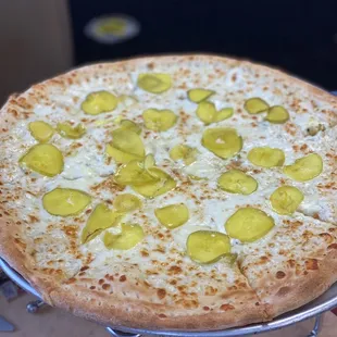 Pickle pizza with ranch sauce
