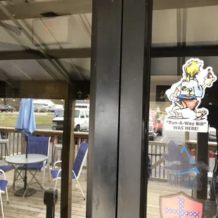 a sign in the window