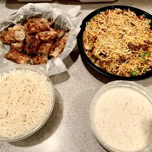 Chicken Seekh Kabab, Goat Biryani, rice, Raita