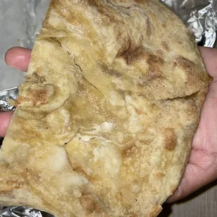 Tandoori roti under cooked as well