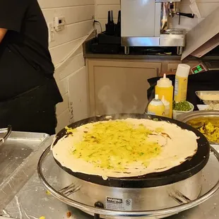 a man holding a plate of food