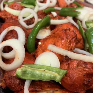 Chicken tikka (bone in).  Made fresh and ready by order.