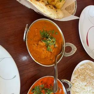 Butter chicken and Lamb Korma with garlic naan.